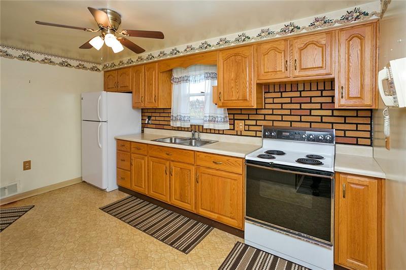 720 Cemetery Road Perryopolis, PA 15473 - Photo 6 of 19 Kitchen with beautiful oak cabinets