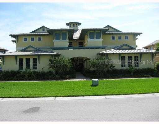 1125 Riverscape Street, Unit 4C Bradenton, FL 34208 - Photo 1 of 1 Exterior Front - Key West Style complete with Metal Roof & Pergola
