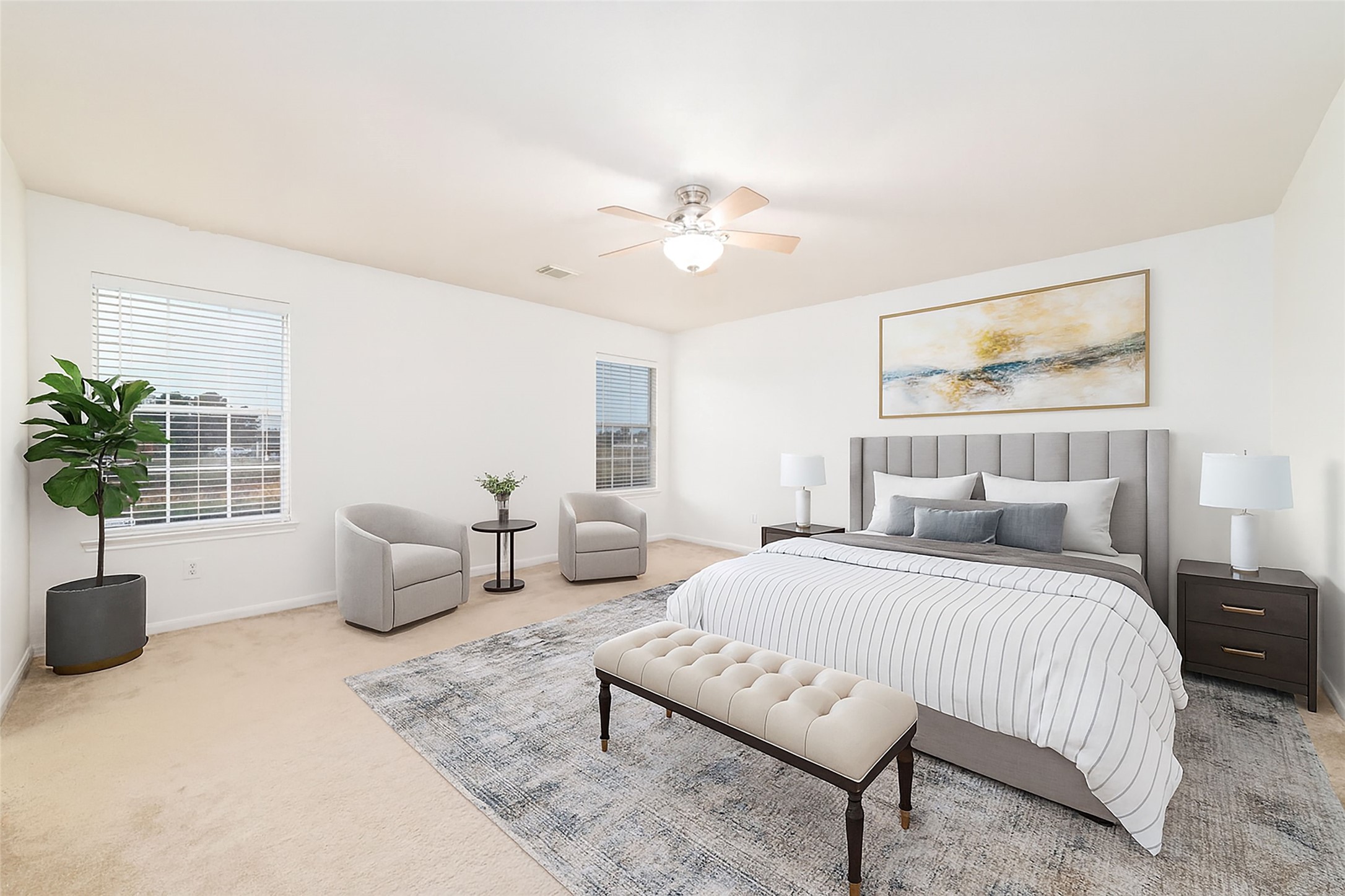 21311 Shadow River Lane Spring, TX 77379 - Photo 3 of 38 a bedroom with a large bed couch and a potted plant