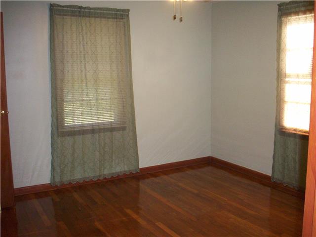 3066 Fly Road Santa Fe, TN 38482 - Photo 4 of 11 BEDROOM WITH POLISHED WOOD FLOORS