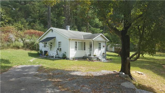 3066 Fly Road Santa Fe, TN 38482 - Photo 10 of 11 HOME HAS 2 COVERED PORCHES, A DRIVEWAY AND LARGE TALL TREES IN THE YARD
