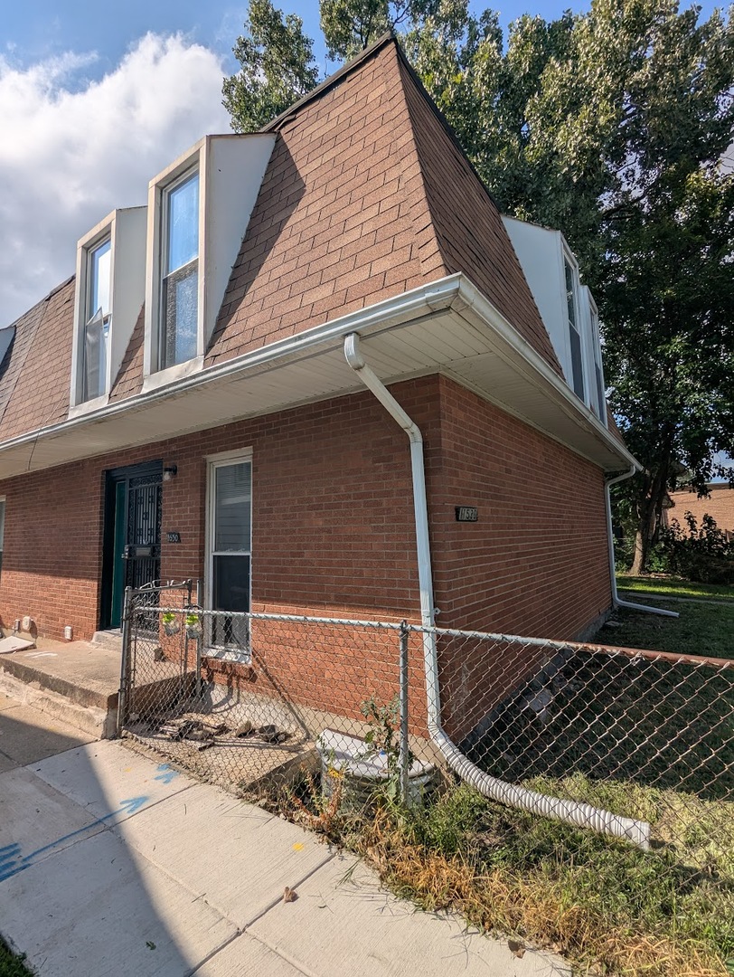 11530 South Racine Avenue Chicago, IL 60643 - Photo 1 of 17 a view of a house with backyard and sitting area