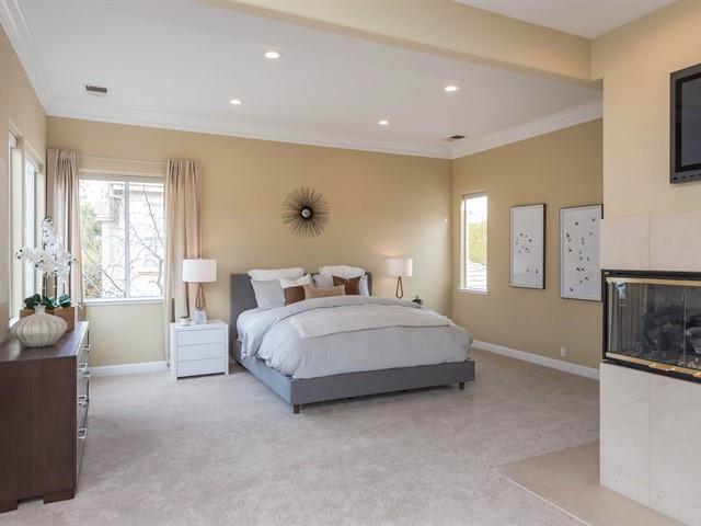 7209 Emami Drive San Jose, CA 95120 - Photo 16 of 33 a spacious bedroom with a bed and a couch