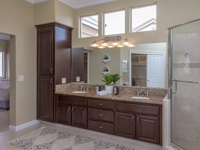 7209 Emami Drive San Jose, CA 95120 - Photo 20 of 33 a bathroom with a granite countertop double vanity sink and a mirror