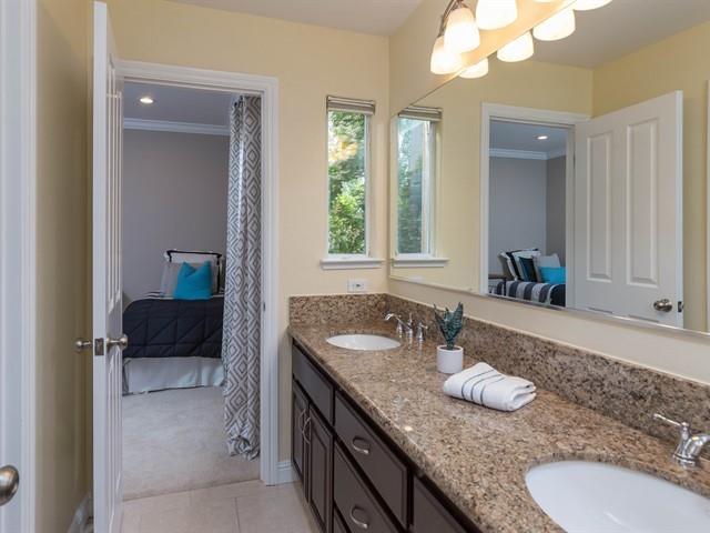 7209 Emami Drive San Jose, CA 95120 - Photo 22 of 33 a bathroom with a granite countertop sink and a mirror