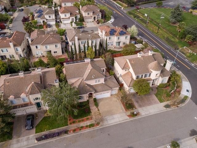 7209 Emami Drive San Jose, CA 95120 - Photo 26 of 33 an aerial view of multiple houses with a yard