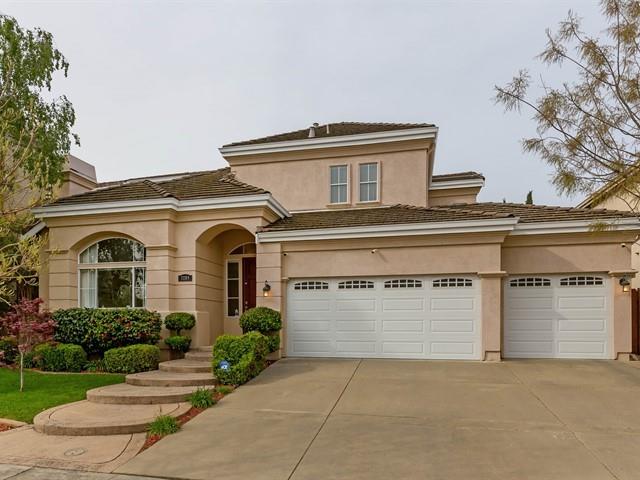 7209 Emami Drive San Jose, CA 95120 - Photo 31 of 33 a front view of a house with a yard and garage