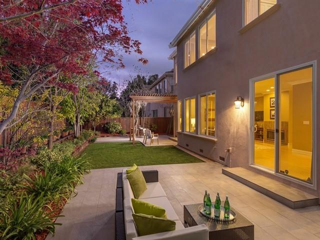 7209 Emami Drive San Jose, CA 95120 - Photo 4 of 33 a front view of a house with garden and patio