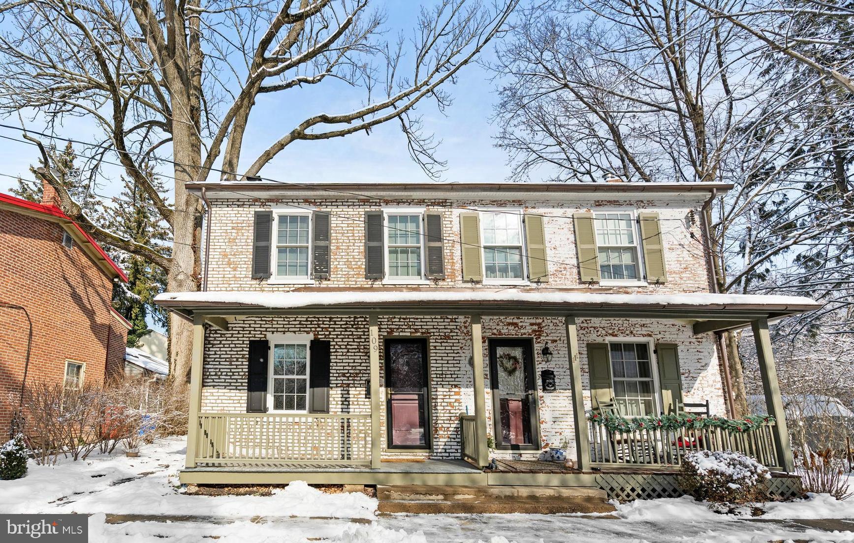 a front view of a house with a porch