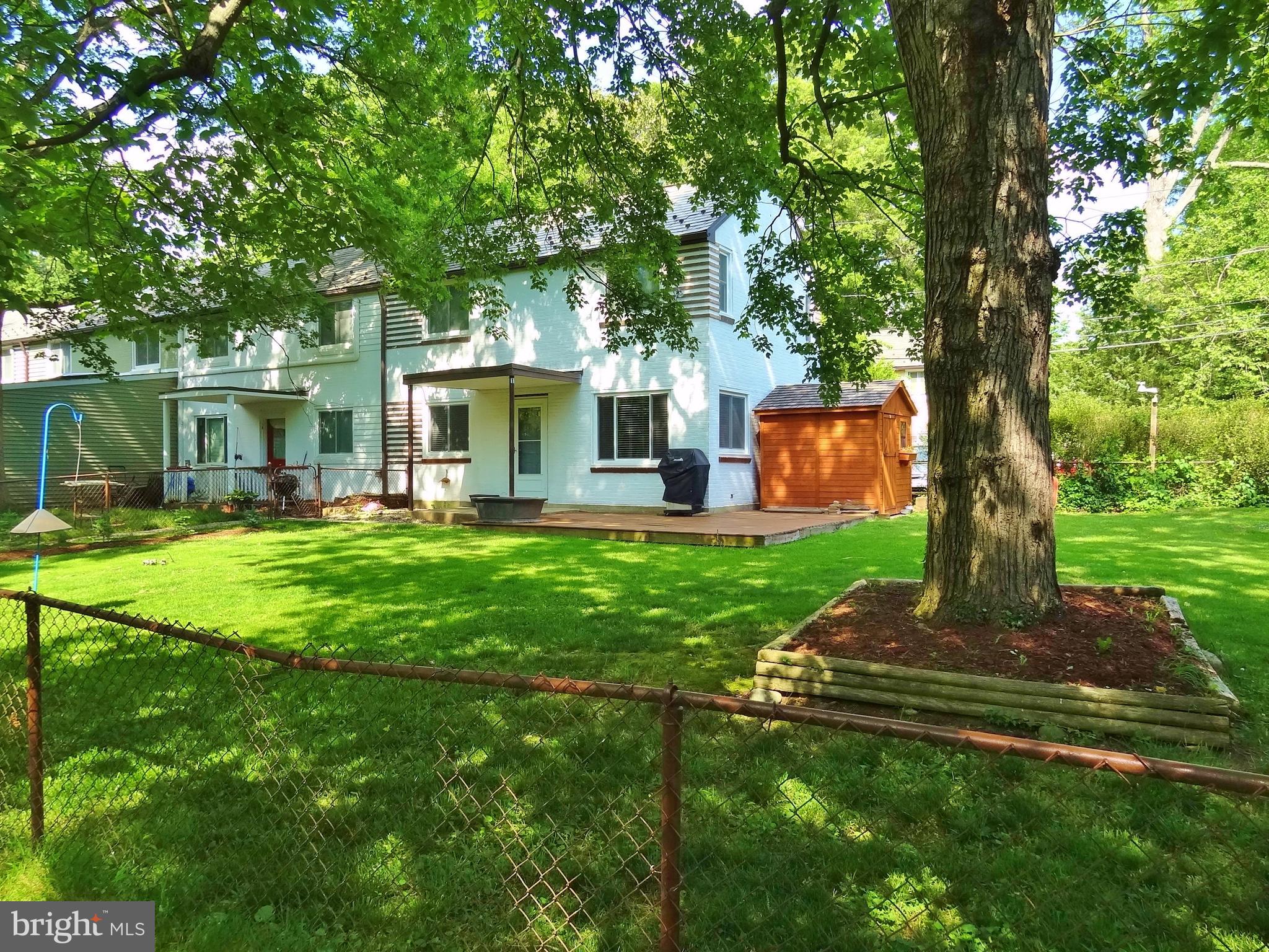 1 Northway Road, Unit A Greenbelt, MD 20770 - Photo 2 of 22 Large, fenced corner lot with Trex deck & shed