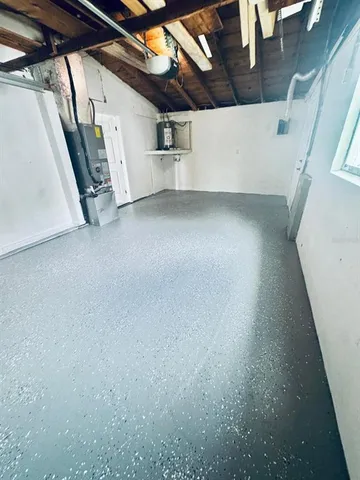 a view of a room with wooden walls