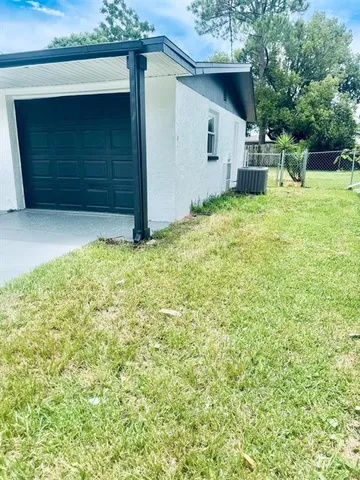a house with garden in front of it