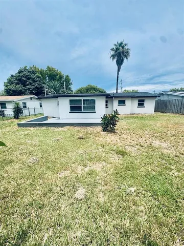 a front view of a house with yard