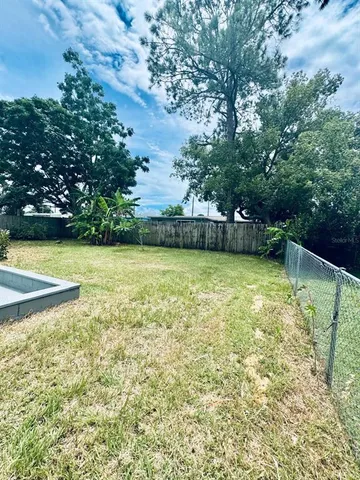 a view of a swimming pool with an outdoor space