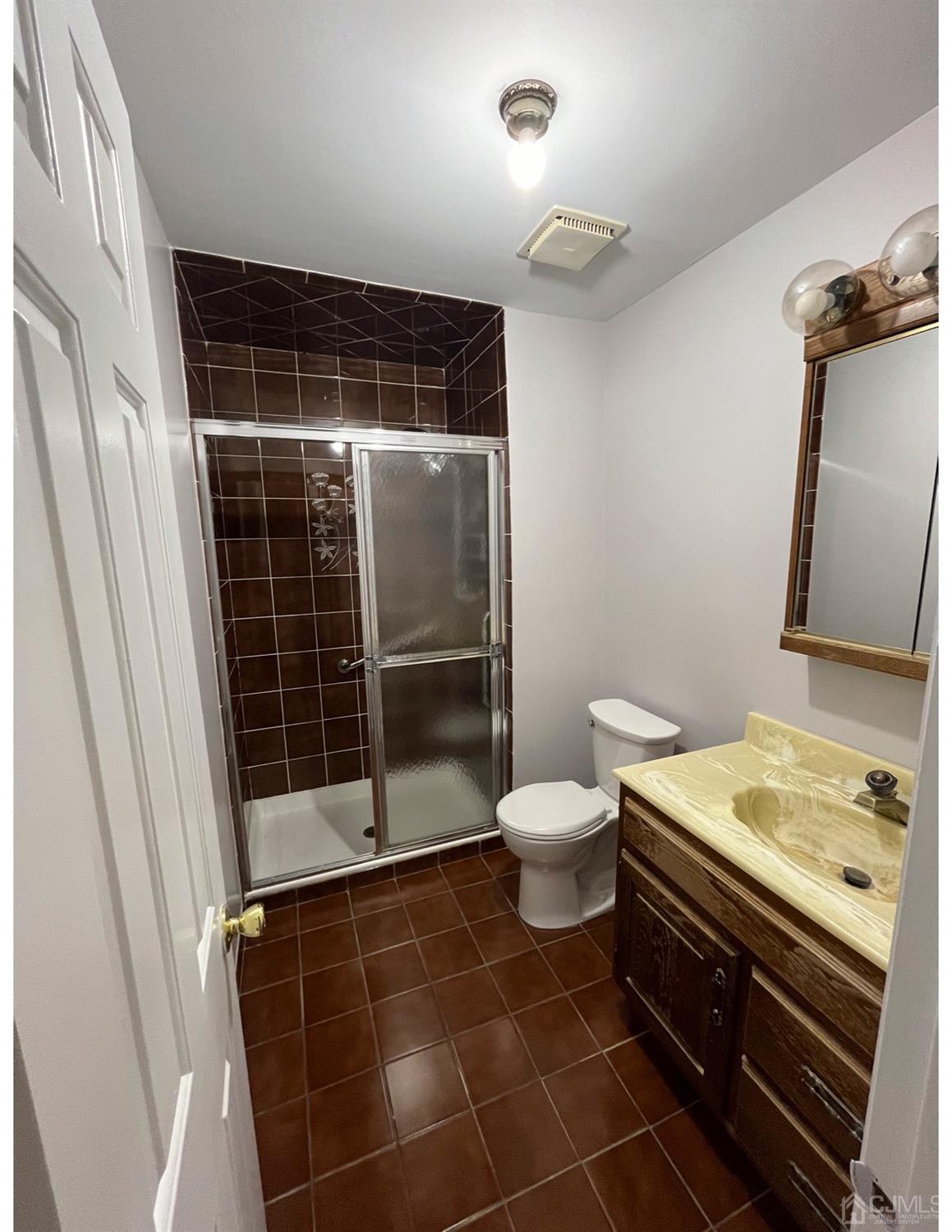 23 Pendleton Place Old Bridge, NJ 08857 - Photo 13 of 14 a bathroom with a toilet and a shower