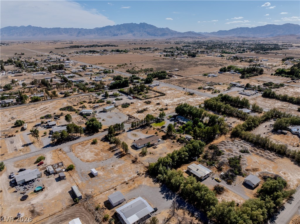 1890 West Dyer Road Pahrump, NV 89048 - Photo 37 of 40 This elevated view captures the expansive landscape surrounding a charming desert community.