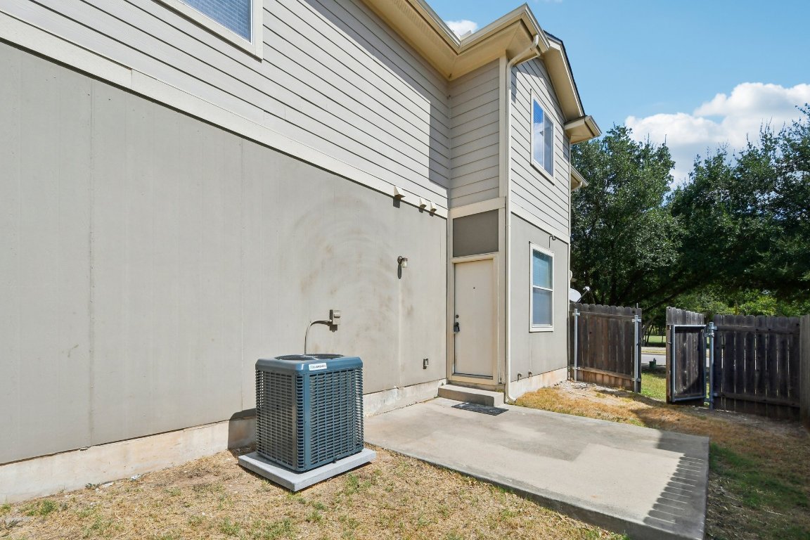14504 Harris Ridge Boulevard, Unit A Pflugerville, TX 78660 - Photo 18 of 23 a backyard of a house