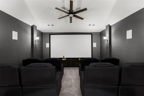 a black and white room with furniture