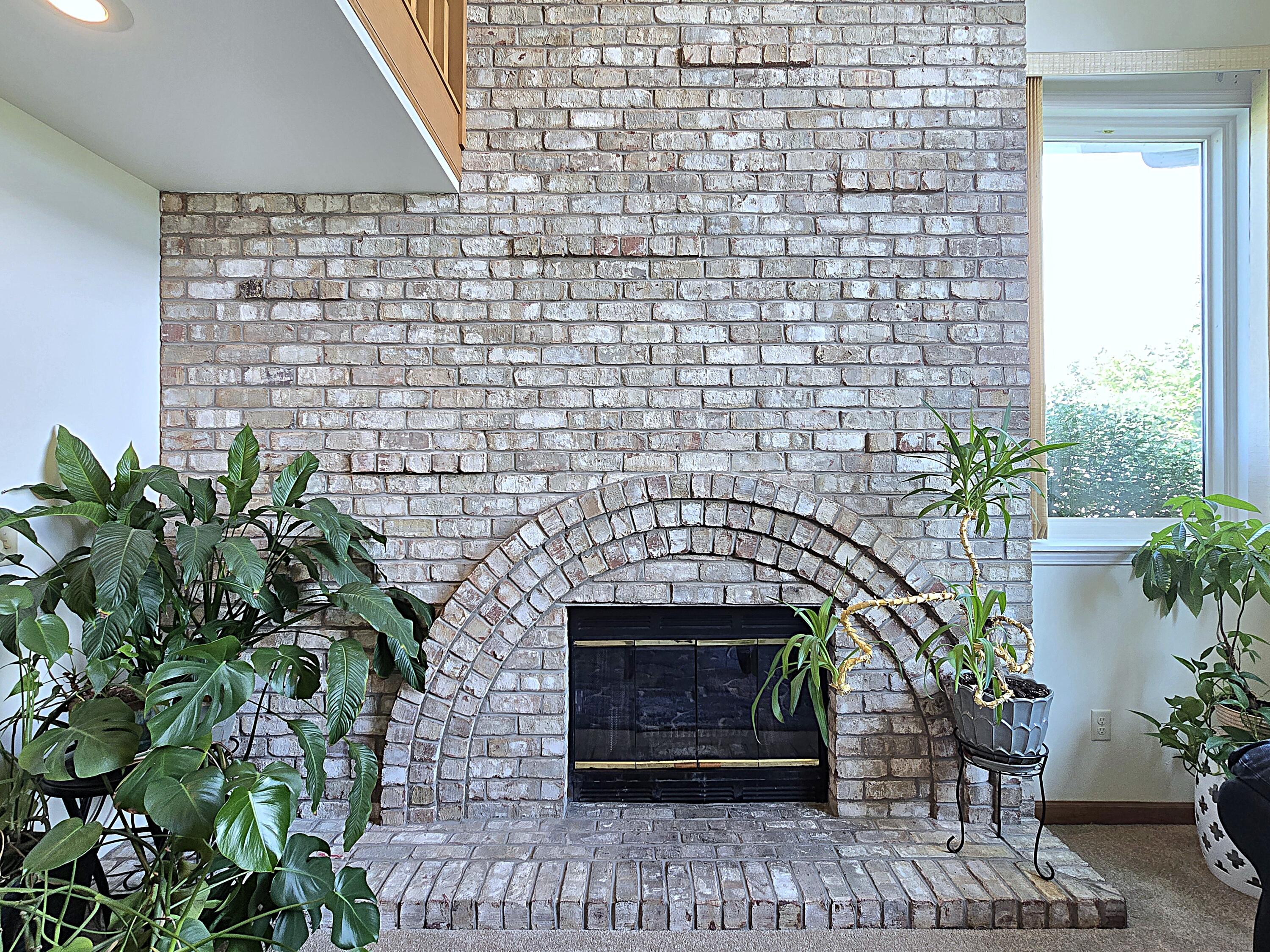 9201 West County Line Road Milwaukee, WI 53224 - Photo 18 of 54 Family Room Fireplace