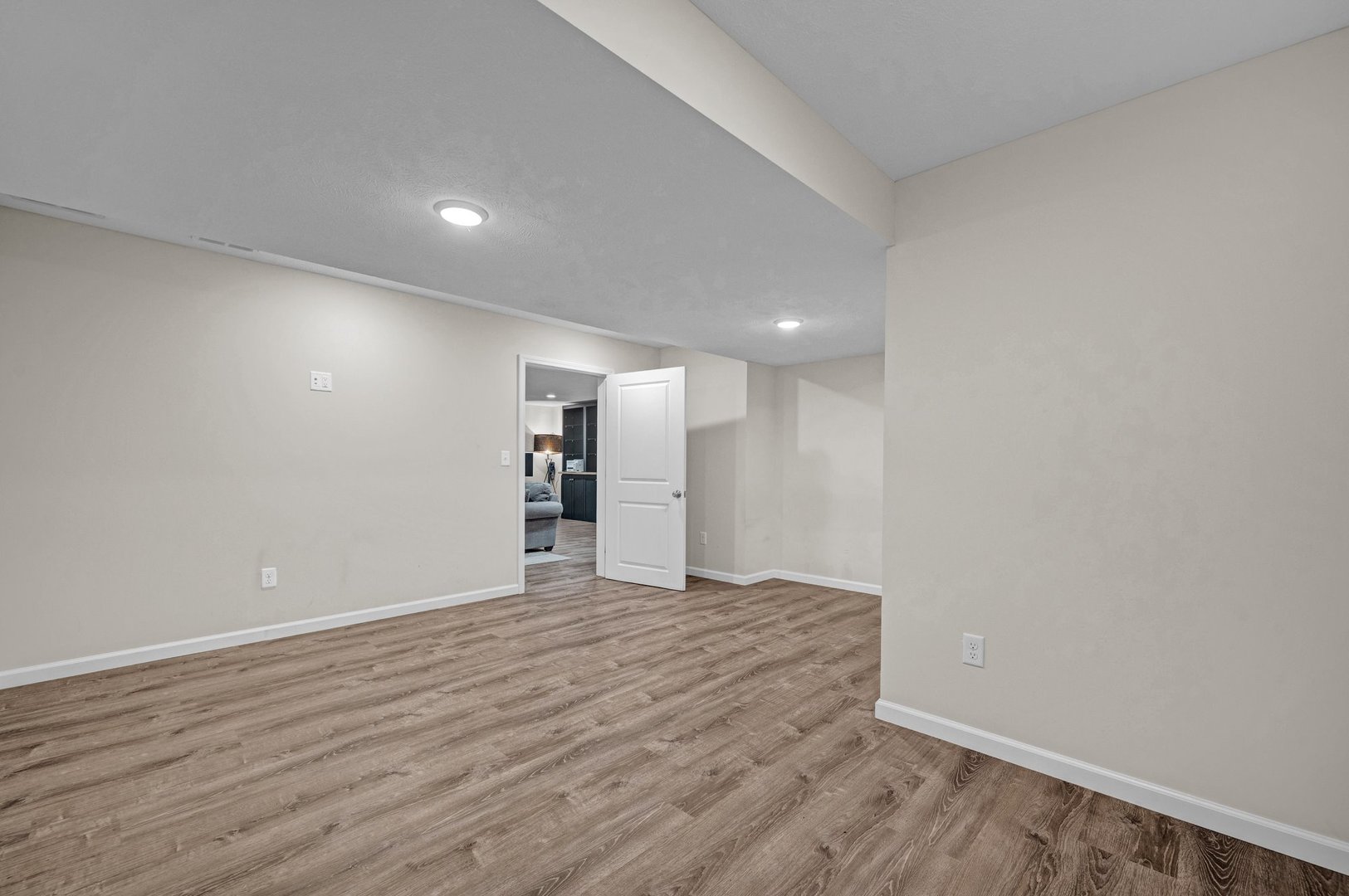277 Cassidy Road Normal, IL 61761 - Photo 27 of 42 a view of empty room with wooden floor