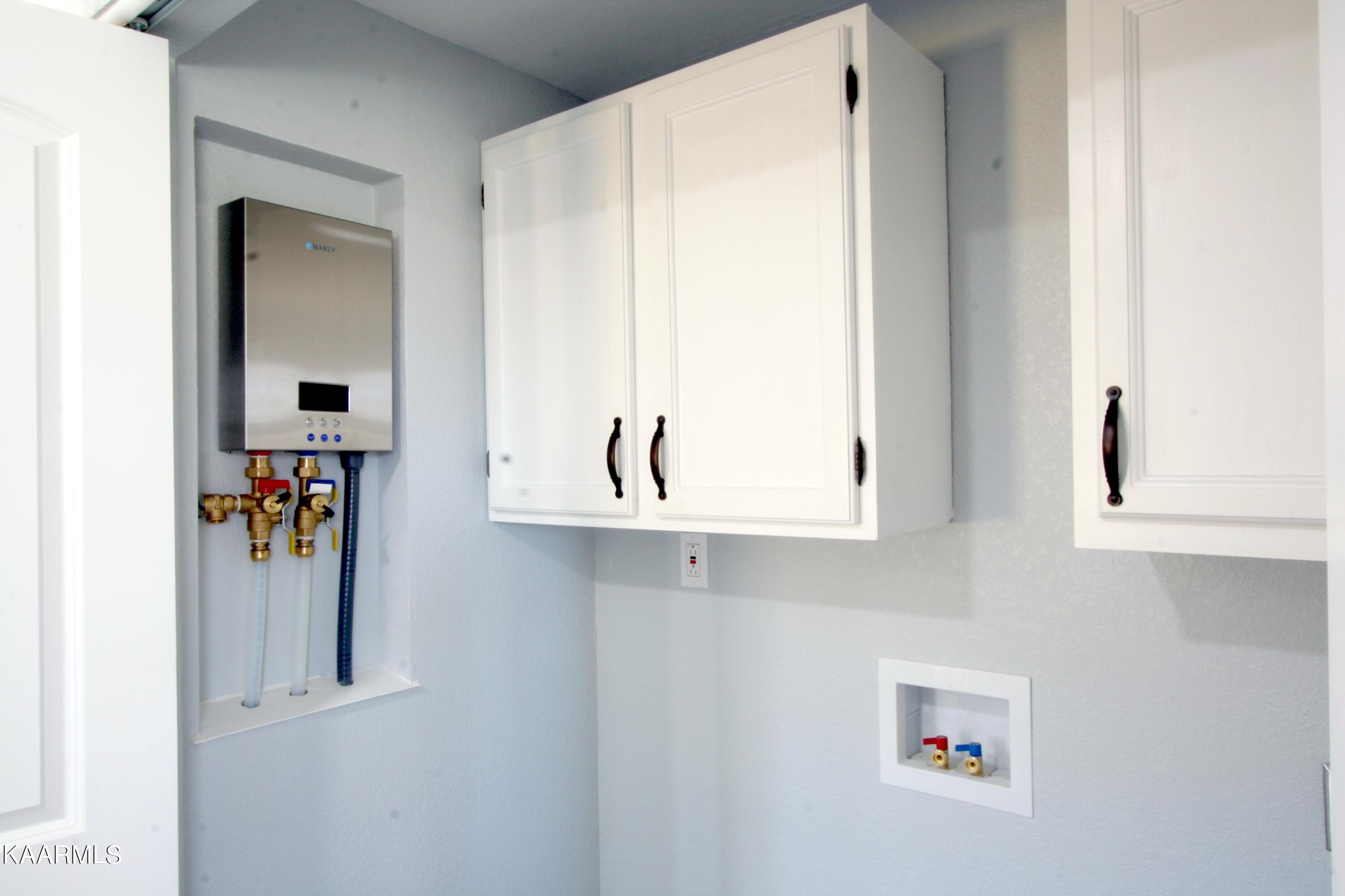 501 Wallace Road Luttrell, TN 37779 - Photo 16 of 38 Laundry Rm & Endless Water Heater 16