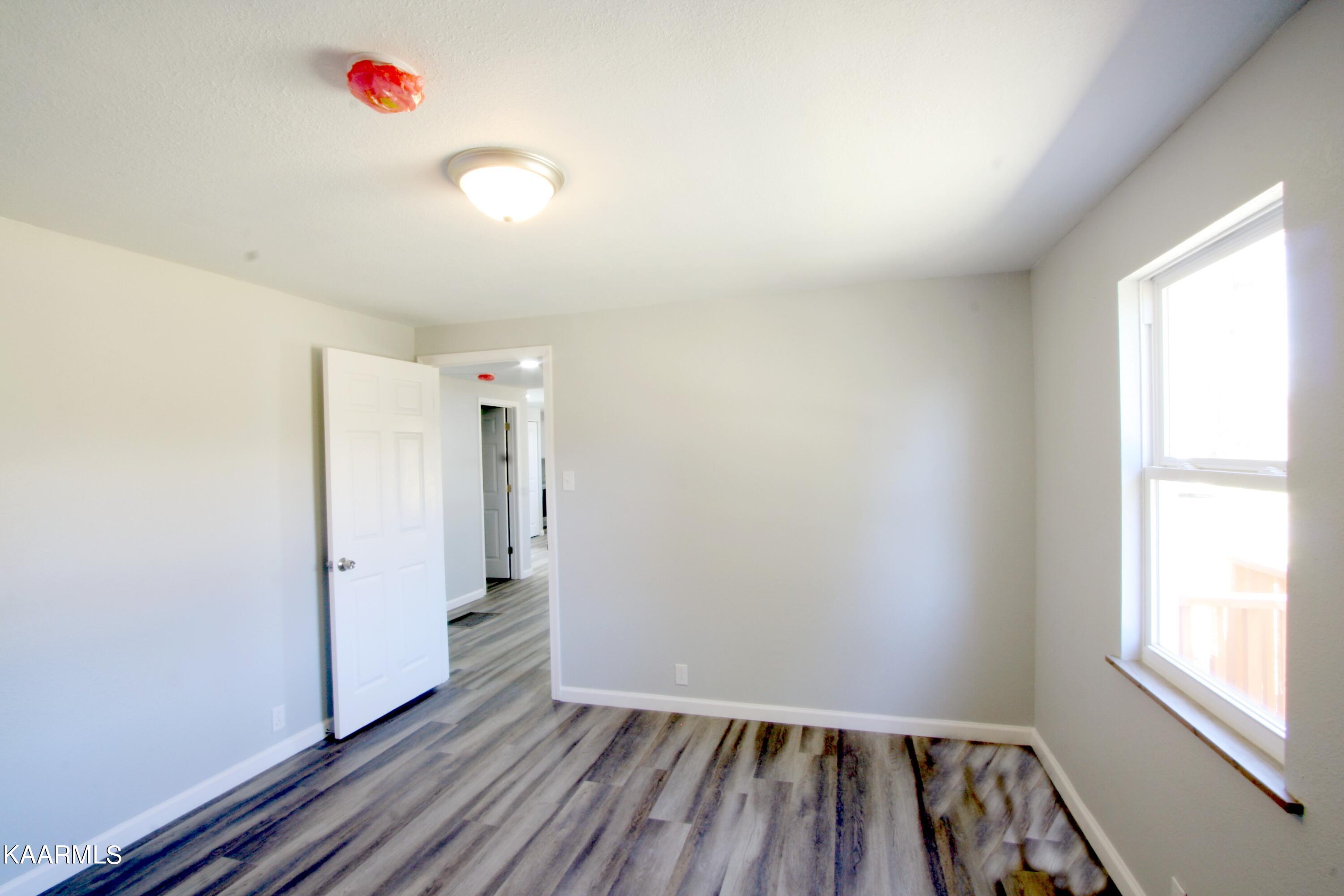 501 Wallace Road Luttrell, TN 37779 - Photo 5 of 38 2nd Bedrm To Living RM 09