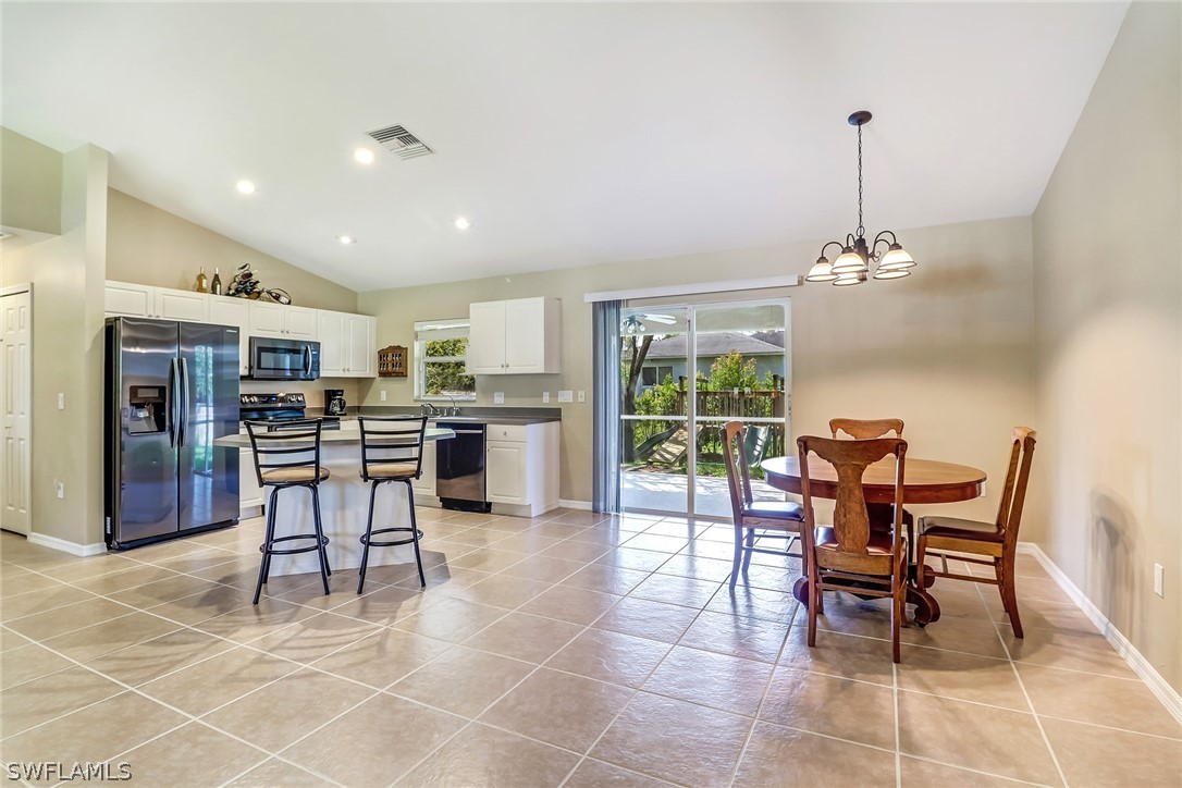 9050 Henry Road Fort Myers, FL 33967 - Photo 4 of 16 a dining room well furnished