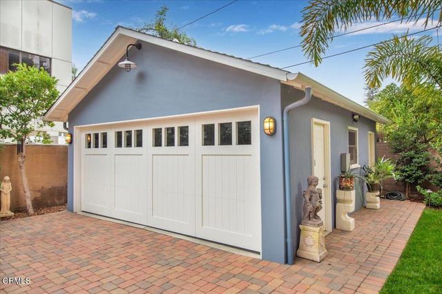 a view of a hallway with stairs