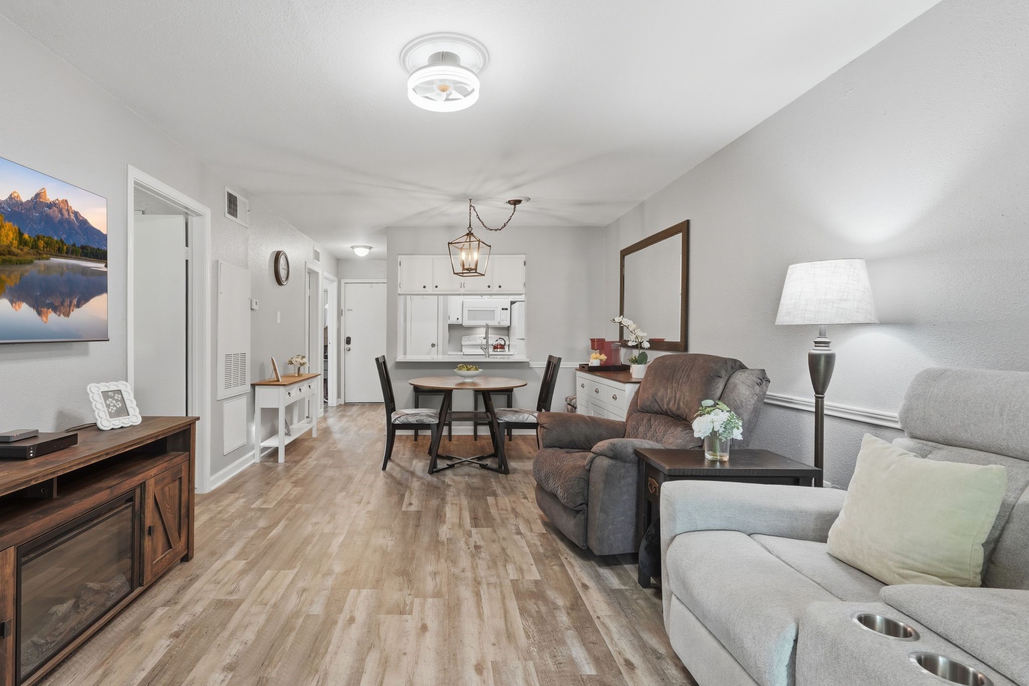 13151 Walden Road, Unit 131 Montgomery, TX 77356 - Photo 7 of 35 Open-concept living and dining spaces with an airy, welcoming atmosphere.