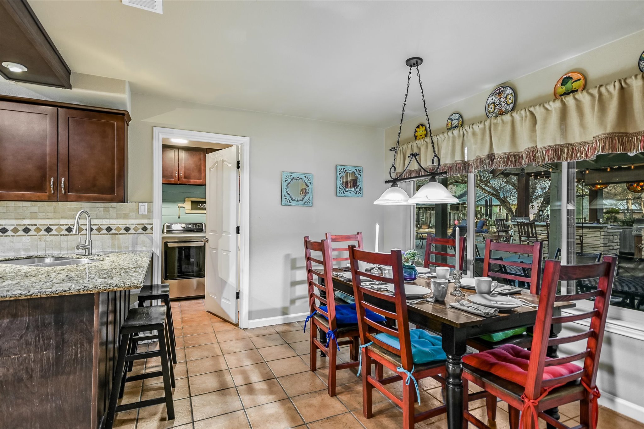 1801 Sun Lake Round Rock, TX 78681 - Photo 12 of 31 Looking into the dining and kitchen area from the central living room.