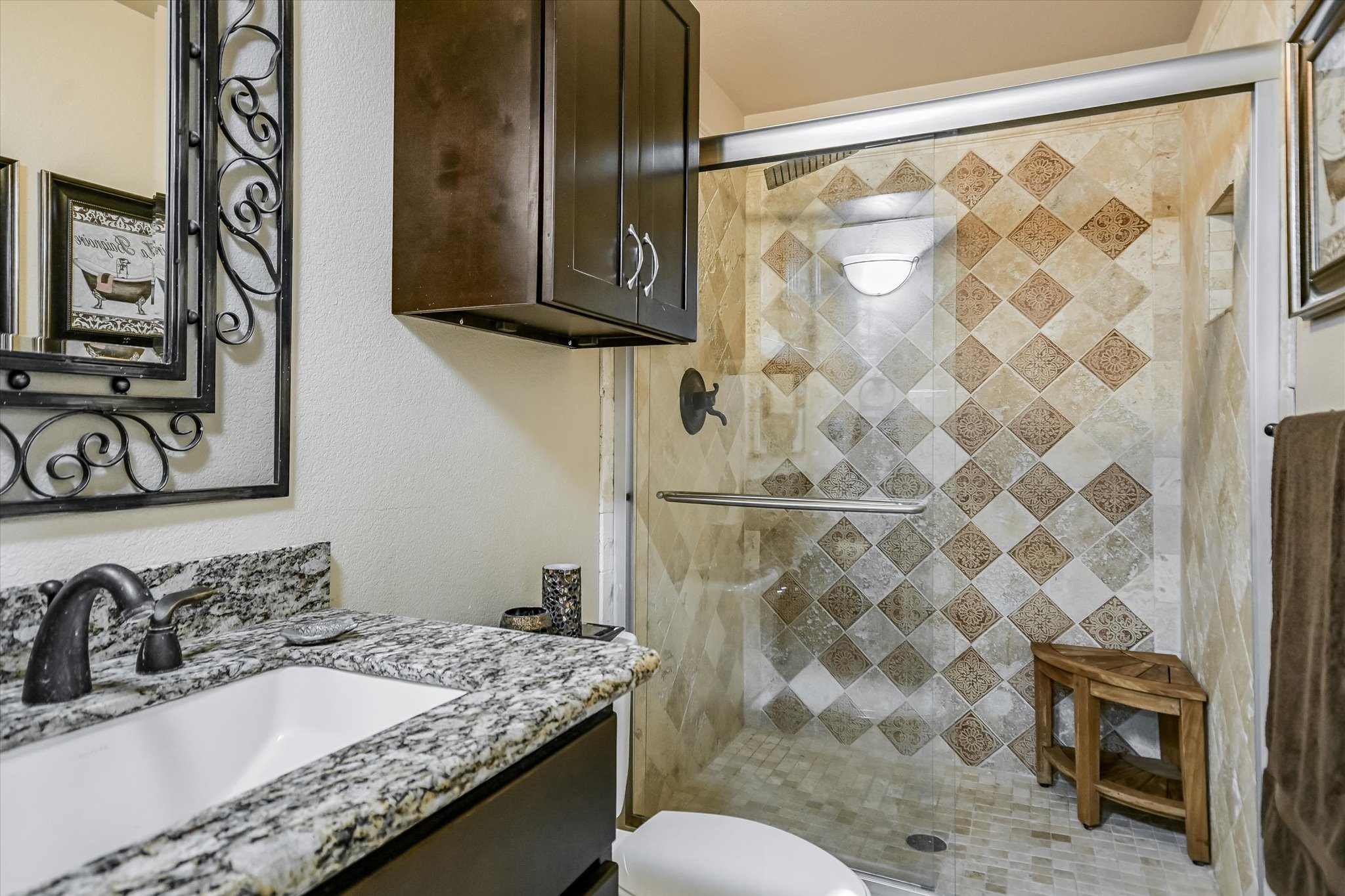 1801 Sun Lake Round Rock, TX 78681 - Photo 17 of 31 Full bathroom downstairs next to secondary bedroom featuring with a beautiful tiled shower.