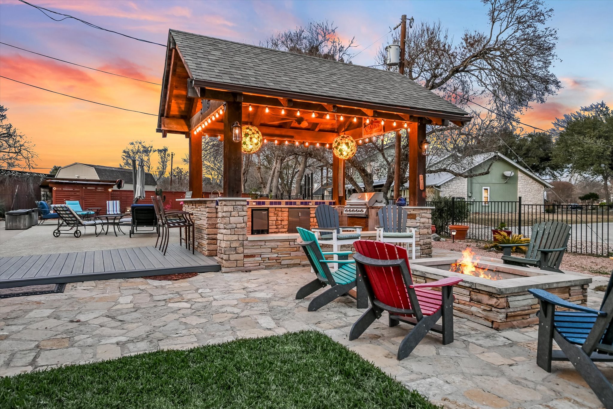1801 Sun Lake Round Rock, TX 78681 - Photo 27 of 31 The cabana provides that perfect gathering spot with a built in grill, storage, and refrigerator. The built-in firepit is the perfect winter replacement for the pool.