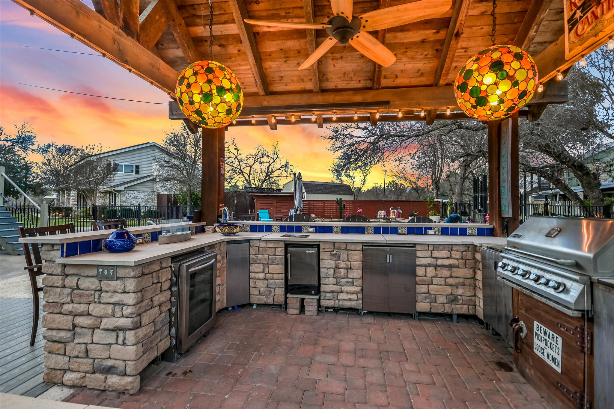1801 Sun Lake Round Rock, TX 78681 - Photo 29 of 31 Interior of the cabana, refrigerator to the left, sink in the corner, storage, and a built in propane grill to the right, along with great evening party lighting!