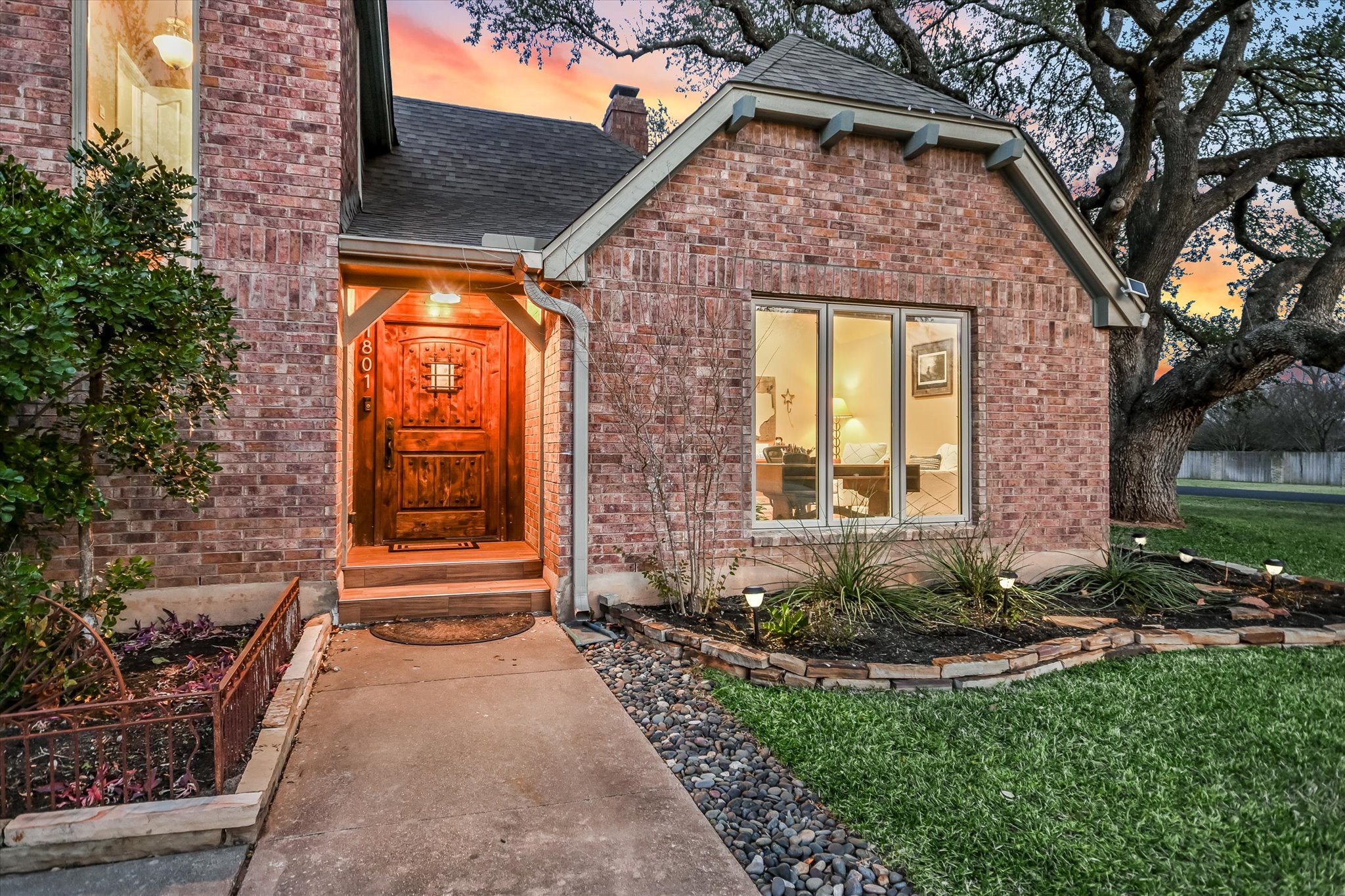 1801 Sun Lake Round Rock, TX 78681 - Photo 3 of 31 A solid wood door welcomes you to this wonderful and inviting home. The heritage oak you see to the right is truly spectacular!