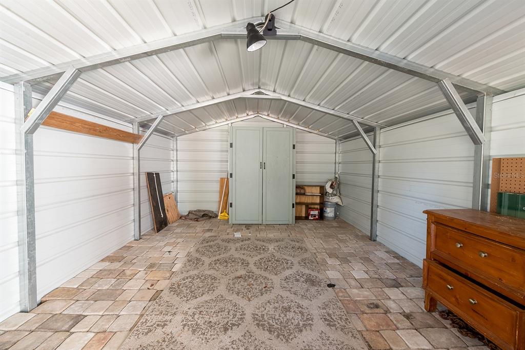 19750 Southeast 30th Street Morriston, FL 32668 - Photo 11 of 52 a view of a garage