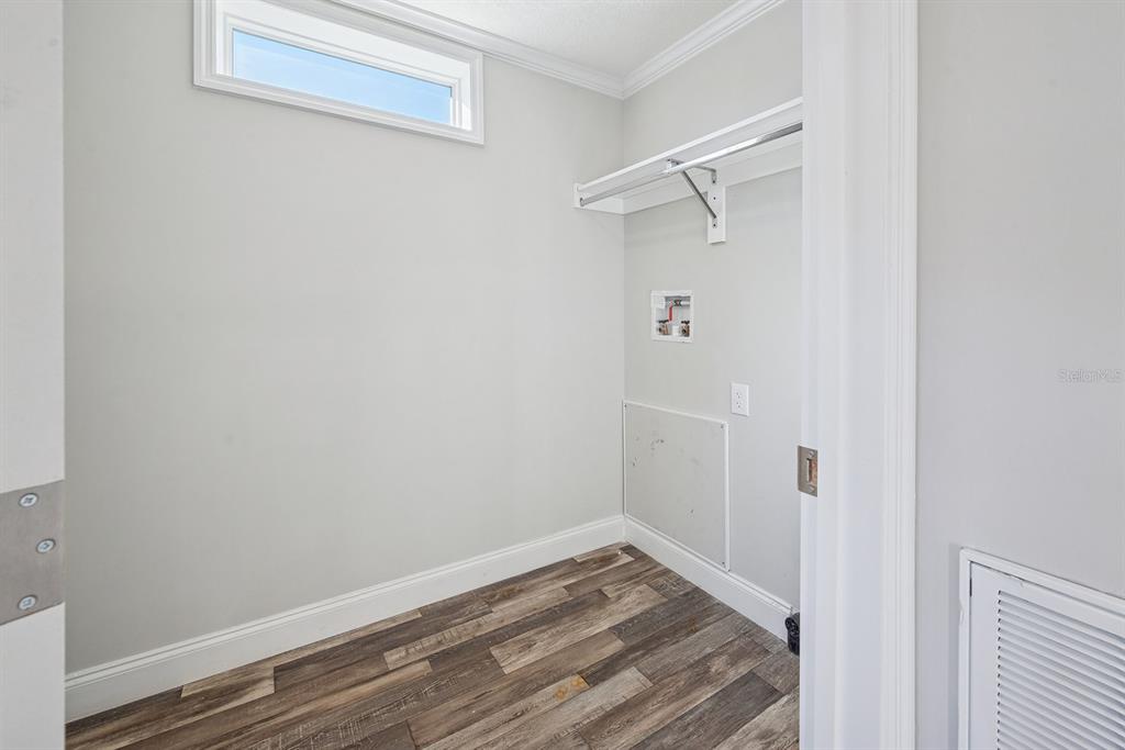 19750 Southeast 30th Street Morriston, FL 32668 - Photo 33 of 52 a view of a room with wooden floor