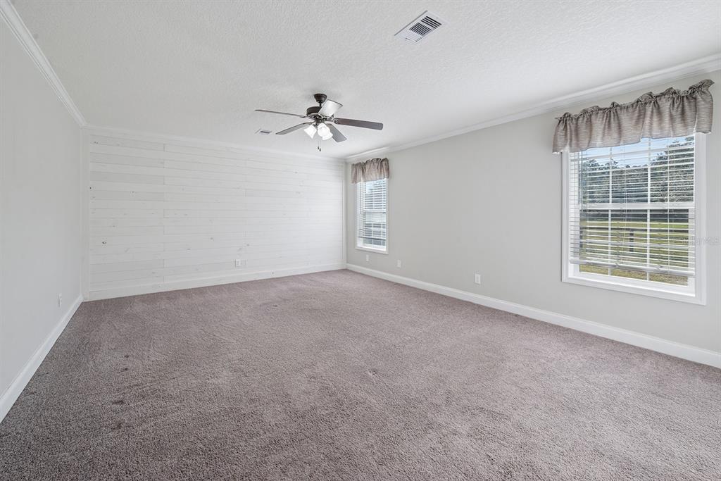 19750 Southeast 30th Street Morriston, FL 32668 - Photo 37 of 52 a view of an empty room with a window