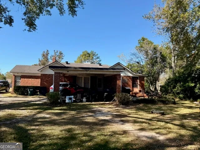 a view of a house with a patio