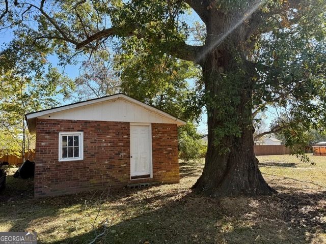 405 South Leroy Street Metter, GA 30439 - Photo 17 of 18 a view of a backyard