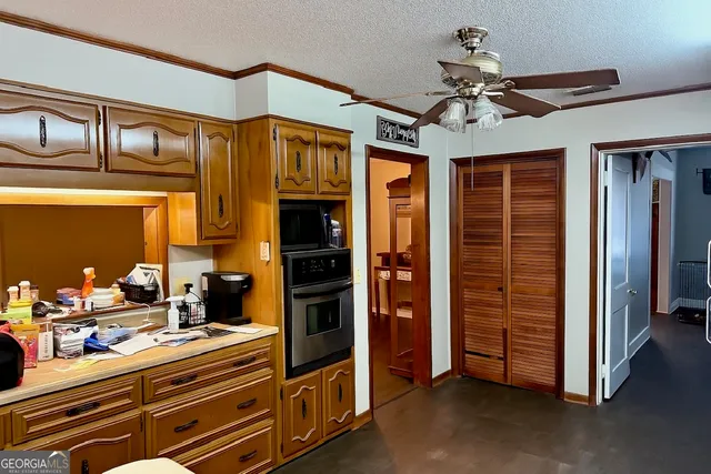 a view of hall way with closet