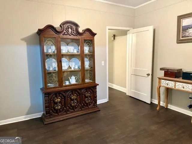 a view of living room with furniture and window