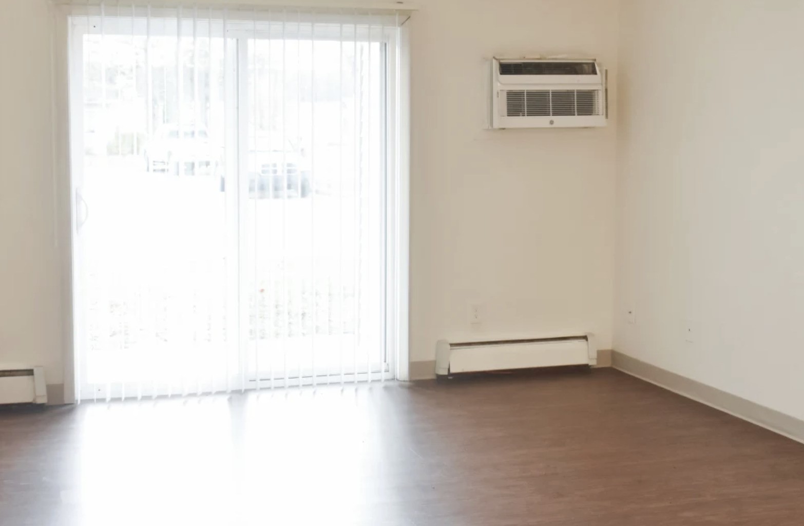 839 South Clinton Street Stockbridge, MI 49285 - Photo 14 of 29 a view of a small space with wooden floor and a window