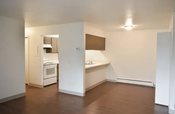 a kitchen with a sink and cabinets