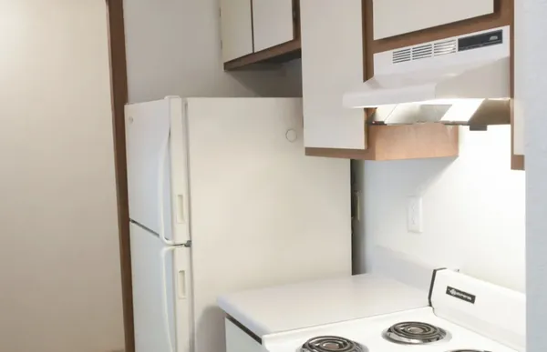 a bathroom with a sink a toilet and a bathtub