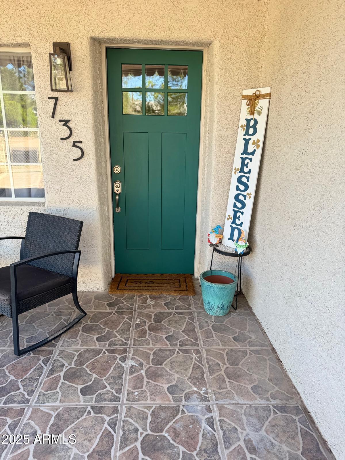 735 East 3rd Street Douglas, AZ 85607 - Photo 2 of 18 a living room with furniture and a window