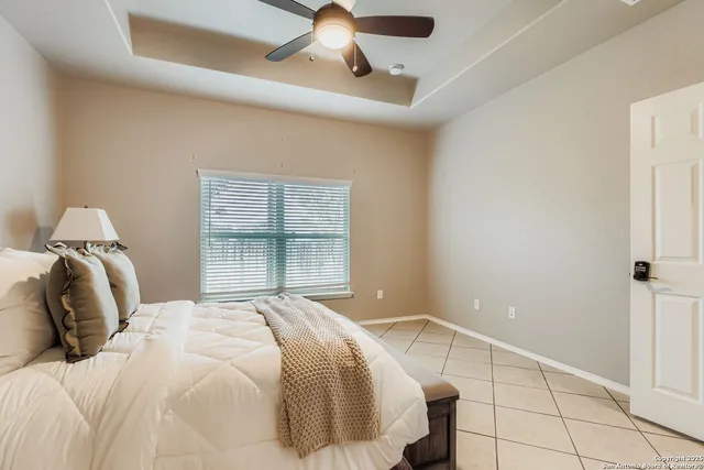 a bathroom with a granite countertop sink mirror and double