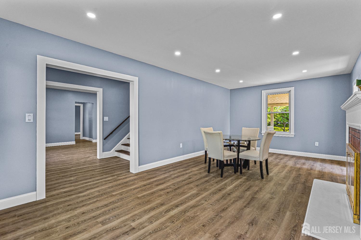 790 Ridge Road Monmouth Junction, NJ 08852 - Photo 13 of 38 a view of a work space with wooden floor and a window