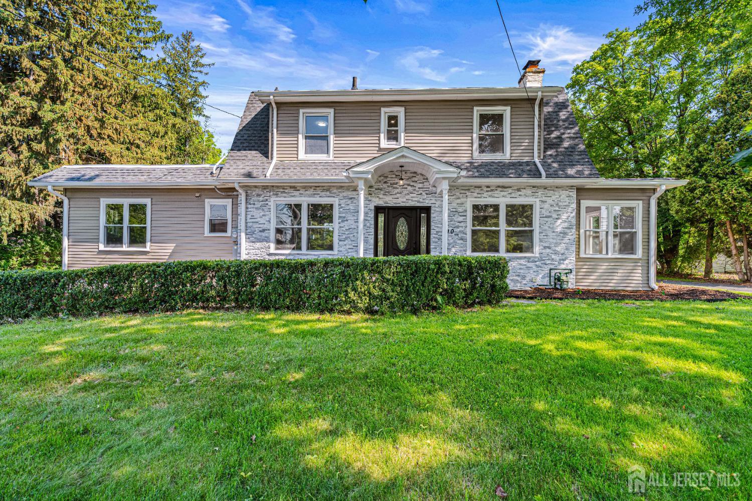 790 Ridge Road Monmouth Junction, NJ 08852 - Photo 2 of 38 front view of a house with a yard