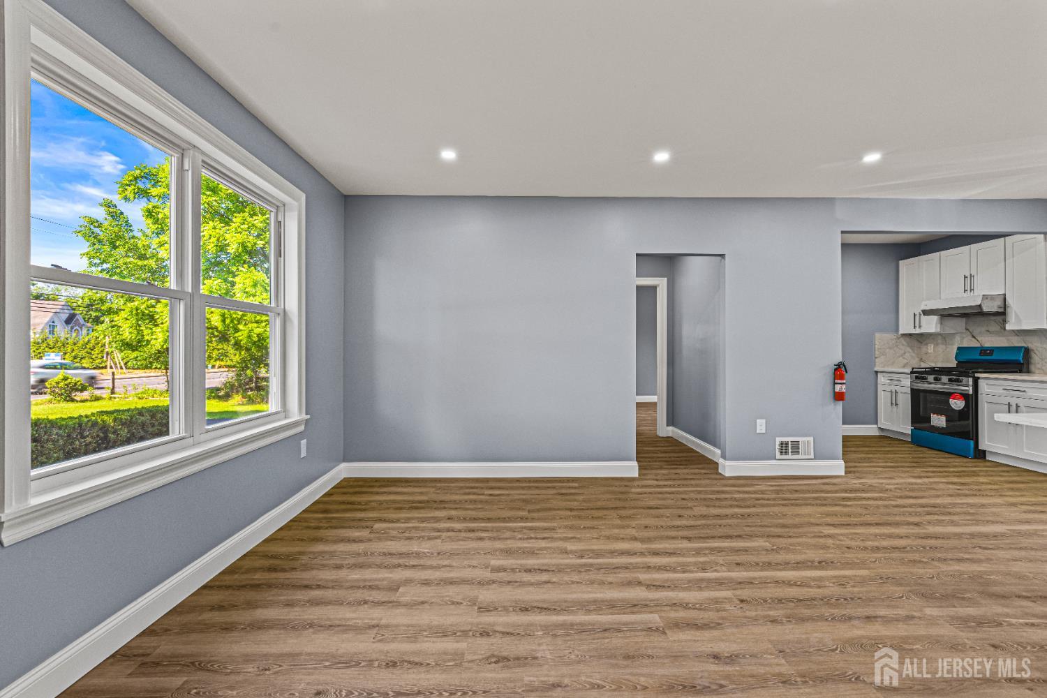 790 Ridge Road Monmouth Junction, NJ 08852 - Photo 23 of 38 a view of empty room with wooden floor and fan