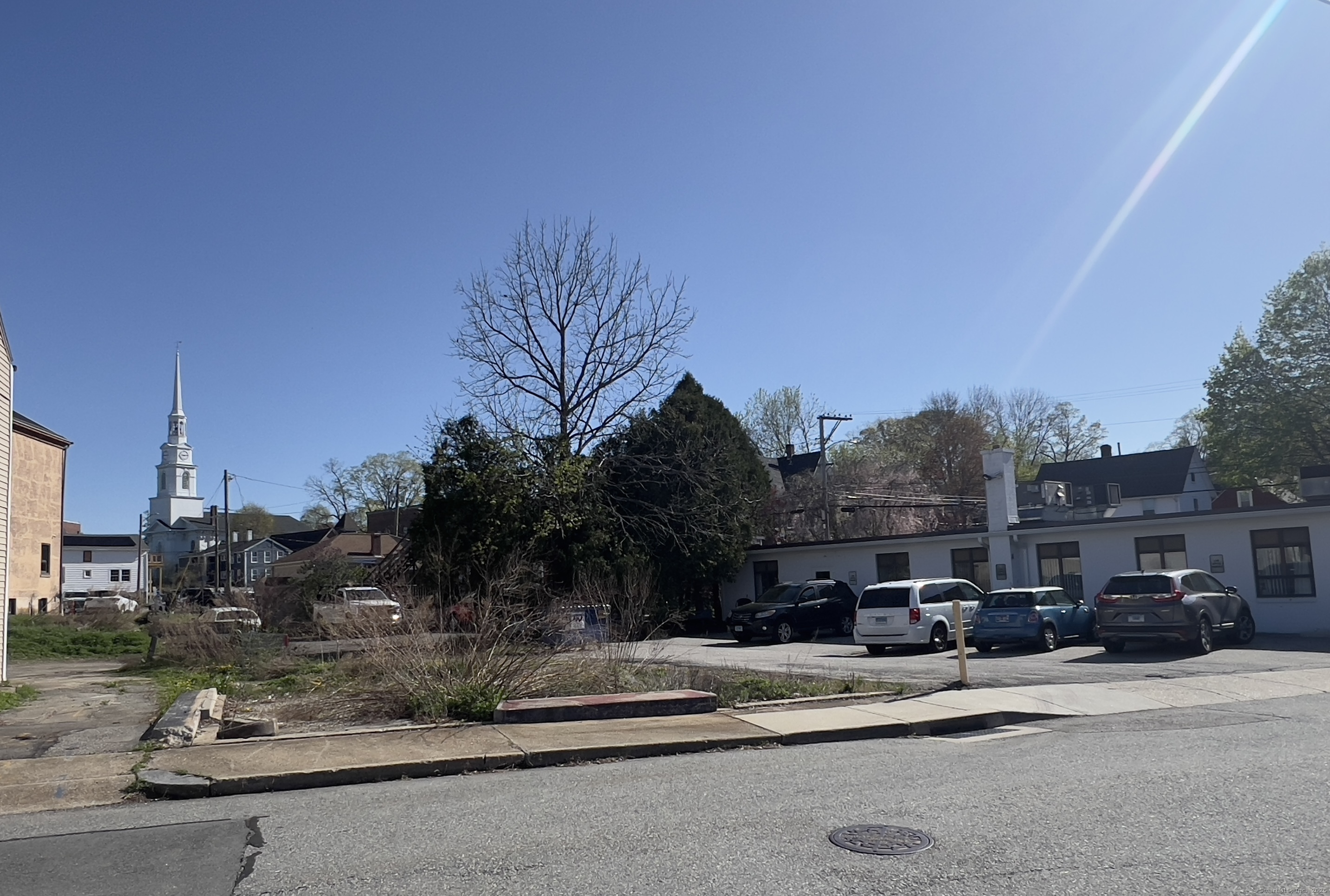 a view of a street with cars